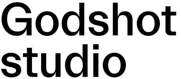 Black text 'Godshot studio' on a white background